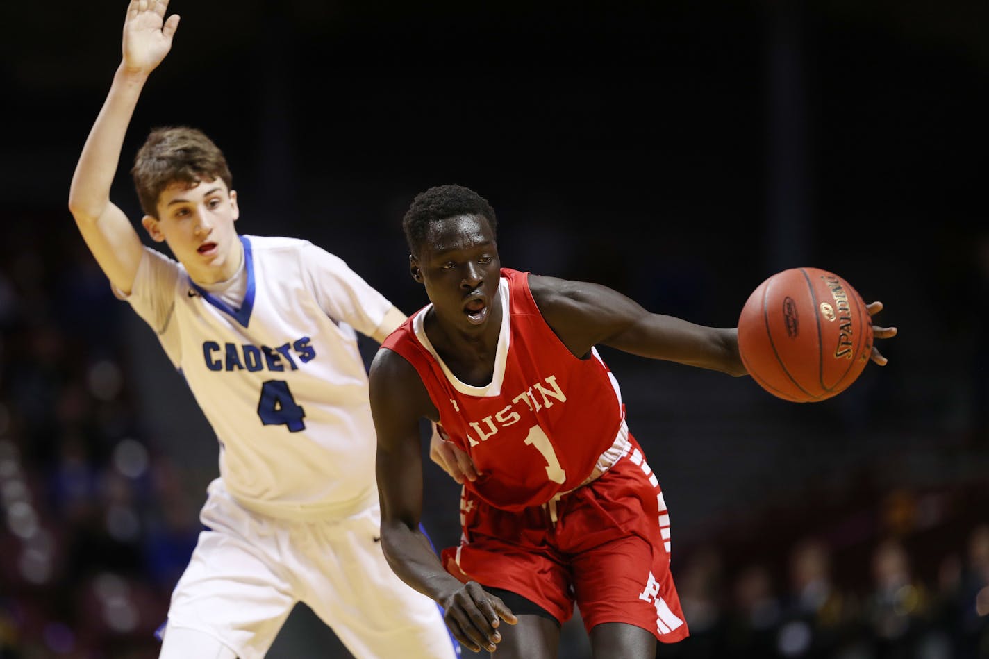 Austin's Both Gach (right, playing in the Class 3A basketball tournament in 2017) will announce his decision on where he will play his junior season of college basketball on Monday, with the Gophers among his five finalists.