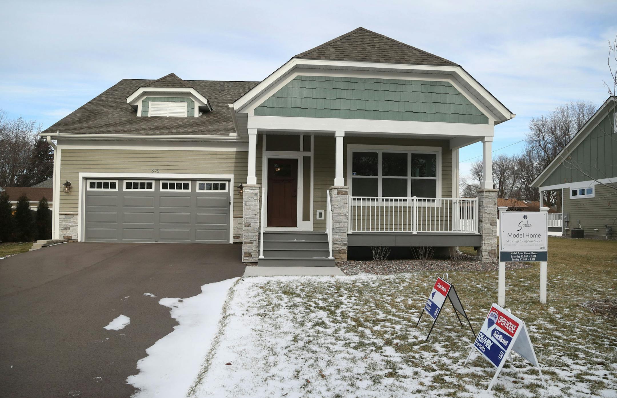 Jason Stockwell and Diane Eldredge, sales agents with Remax Result, hosted an open house at this new 4 bedroom, 3 bath 3,300 square foot rambler in Roseville, one of 18 similar units built by a non-profit developer and seen Saturday, Dec. 10, 2016, in Roseville, MN.] (DAVID JOLES STARTRIBUNE)djoles@startribune.com Did a spike in mortgate rates deter home buyers in the Twin Cities metro? Or push them off the fence? We'll find out when the November sales figures are released on Dec. 14 by the Minn