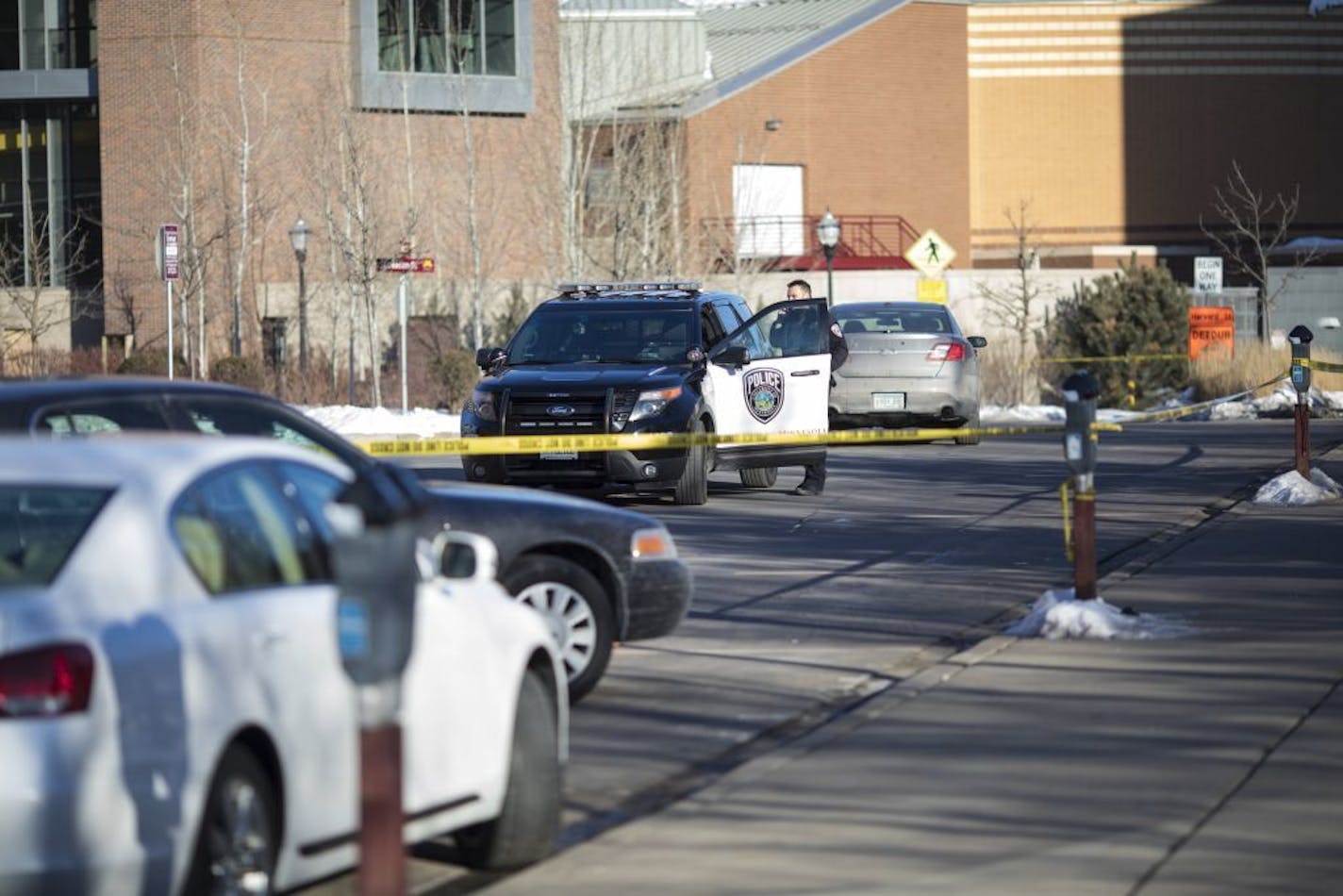 Police cars were parked outside the Graduate Hotel on the East Bank of the University of Minnesota in Minneapolis, Minn.