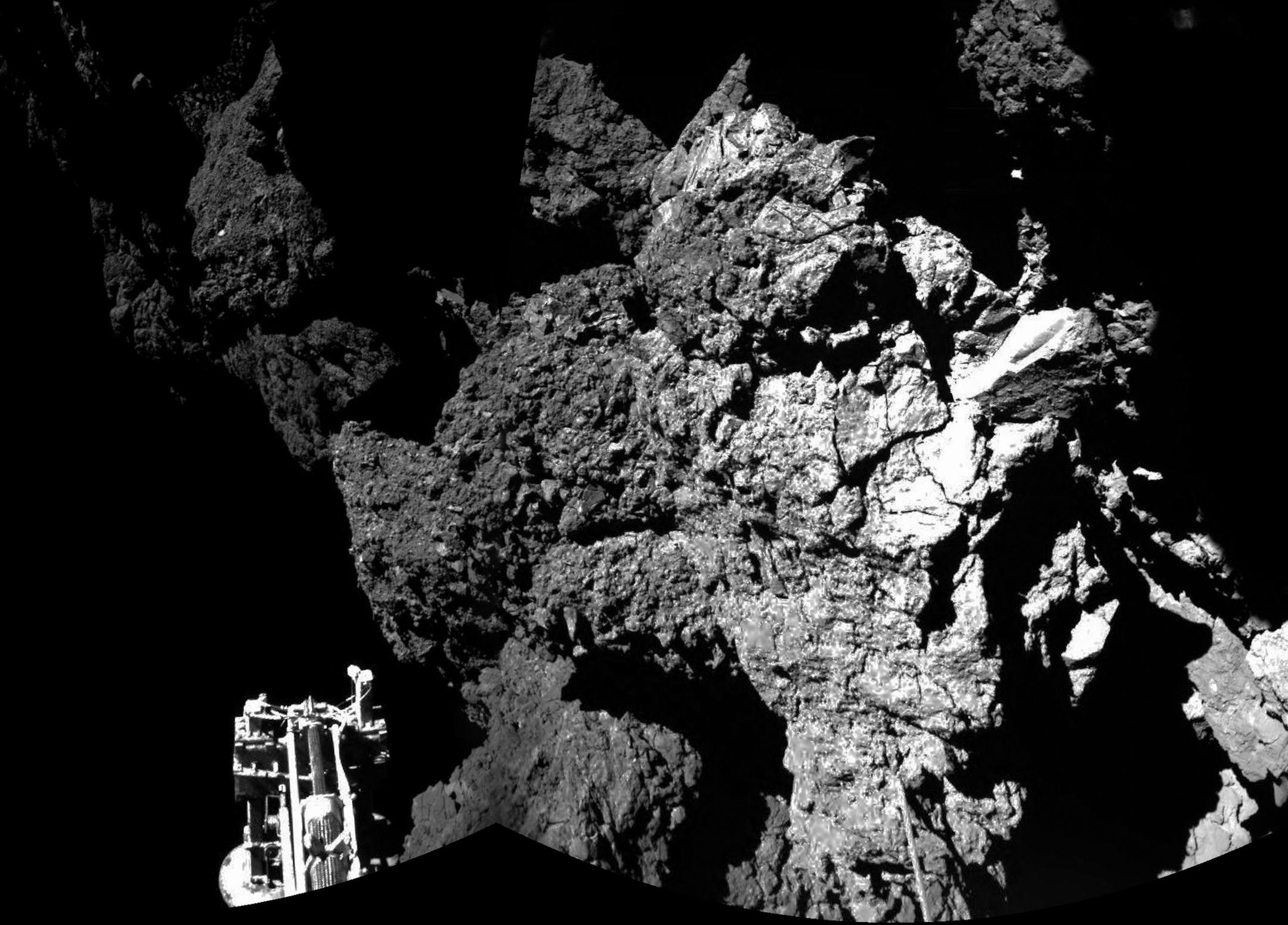FILE- In this file photo dated Thursday Nov. 13, 2014, a combination photo produced with different images taken with the CIVA camera system released by the European Space Agency ESA, shows Rosetta’s lander Philae after landing safely on the surface of Comet 67P/Churyumov-Gerasimenko, as these first CIVA images confirm. One of the lander’s three feet can be seen in the foreground. Philae became the first spacecraft to land on a comet when it touched down Wednesday on the comet, 67P/