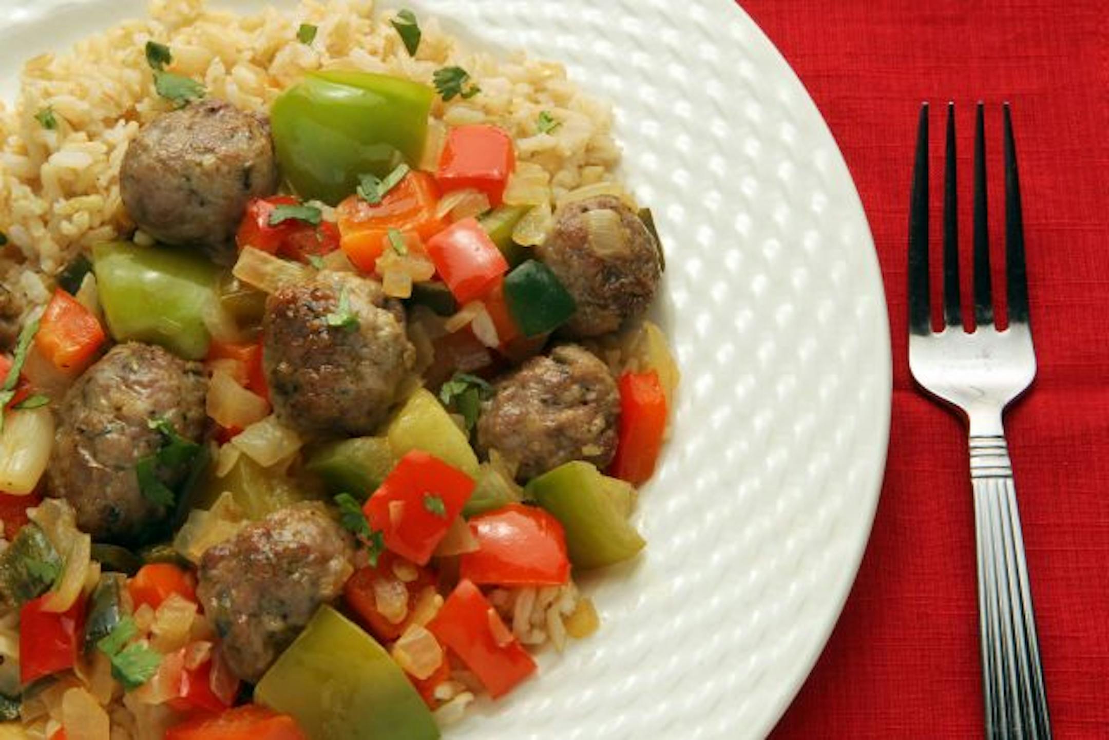 This quick dish of sausage, vegetables and rice utilizes tomatillos.