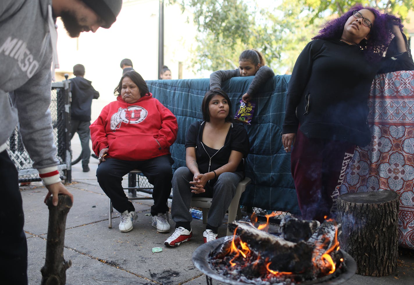 Family members of Pamela Rivera, 51, gathered at the Little Earth housing project to mourn and honor her memory. Rivera died of an apparent drug overdose early Sunday. The family built a "spirit fire" to help her spirit on its journey to join her ancestors.