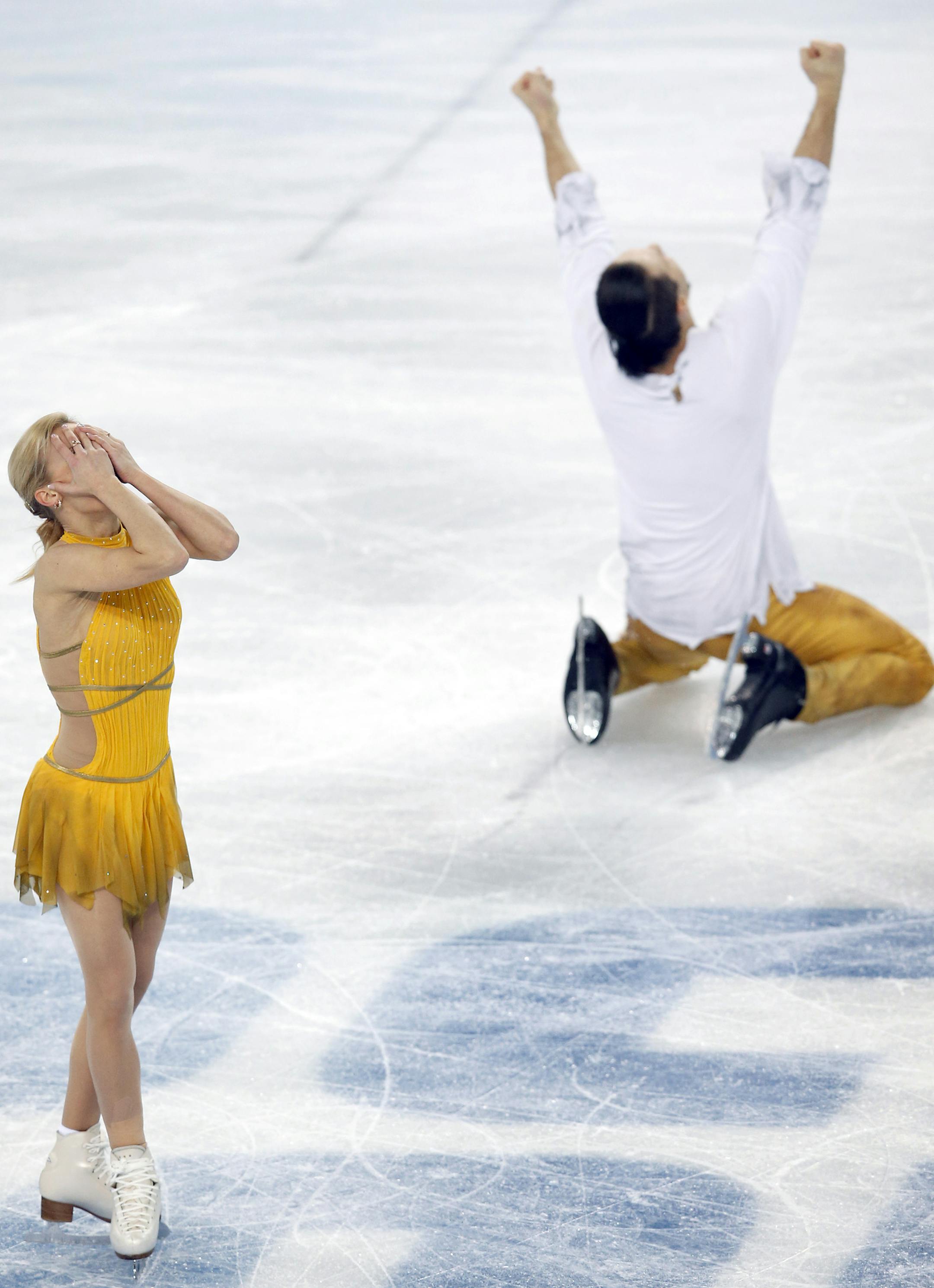 Russia's Tatiana Volosozhar and Maxim Trankov reacted after finishing their performance in the pairs free program. Russia's Tatiana Volosozhar and Maxim Trankov won the gold medal with a score of 236.86, while Russia's Ksenia Stolbova and Fedor Klimov took the silver with a score of 218.68. The bronze medal went to Germany's Aliona Savchenko and Robin Szolokowy (215.78). ] CARLOS GONZALEZ cgonzalez@startribune.com - February 12, 2013, Sochi, Russia, Sochi 2014 Winter Olympics, Iceberg Skating Pa