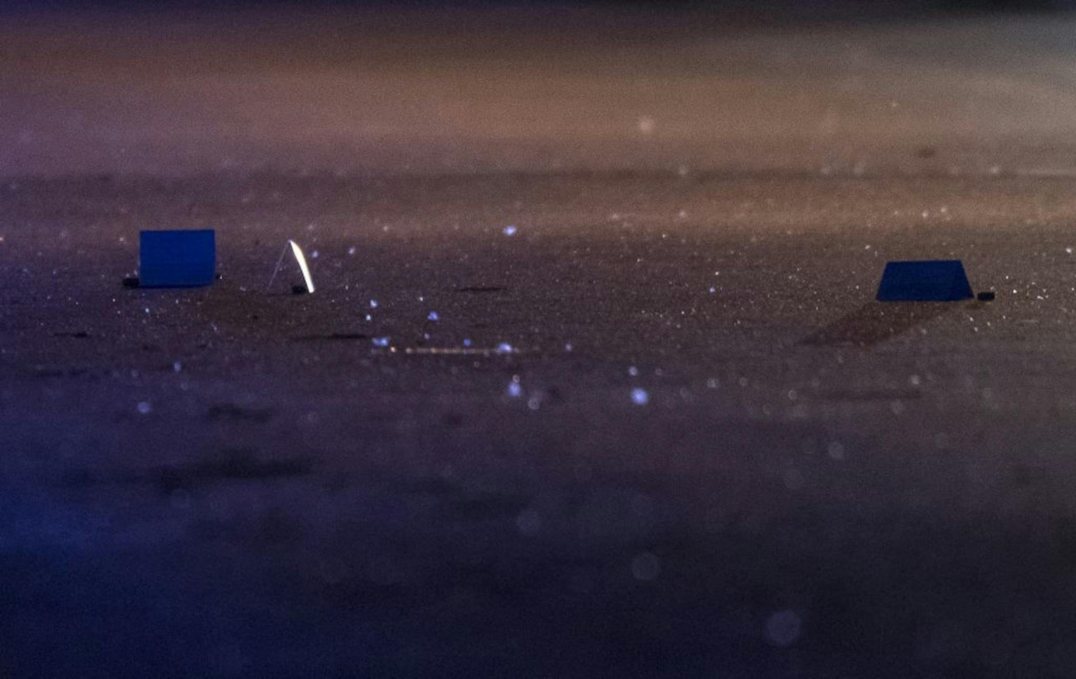 Evidence tags were placed near gun shell casings on Logan Avenue in north Minneapolis.