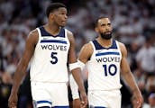 Anthony Edwards (5) and Mike Conley (10) of the Minnesota Timberwolves during Game 4 of the NBA Western Conference Semi-finals at Target Center in Min
