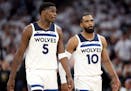 Anthony Edwards (5) and Mike Conley (10) of the Minnesota Timberwolves during Game 4 of the NBA Western Conference Semi-finals at Target Center in Min