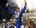 Kyle Busch celebrates in Victory Lane after winning the NASCAR Cup Series auto race, Saturday, Aug. 19, 2017, in Bristol, Tenn. (AP Photo/Wade Payne)