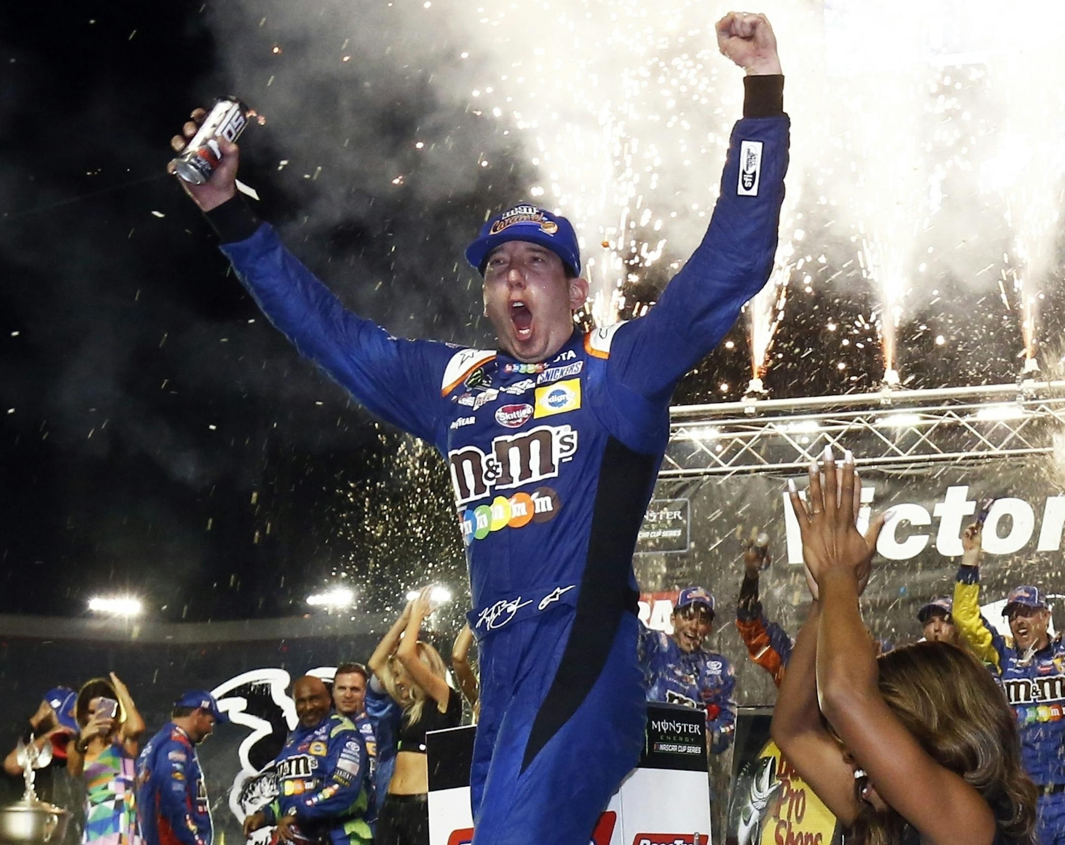 Kyle Busch celebrates in Victory Lane after winning the NASCAR Cup Series auto race, Saturday, Aug. 19, 2017, in Bristol, Tenn. (AP Photo/Wade Payne)