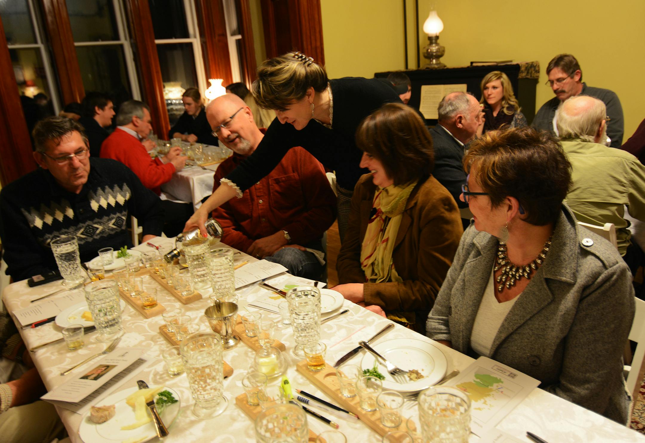 Amy Deaver, the new site manager at the LeDuc historic estate, poured scotch at a recent tasting. Photo by Liz Rolfsmeier, Special to the Star Tribune