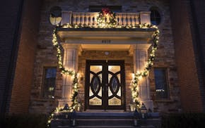 Lighted garland welcomes guests to Bonnie Speer McGrath's home in Edina.
