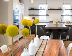 Staging a home with a more modern look, like with this kitchen table, is important to sell a younger buyer on a home. &#x201c;They want that glamorous