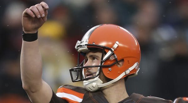 Cleveland Browns kicker Travis Coons watches the ball after kicking a 29-yard field goal during the second half of an NFL football game against the Pi