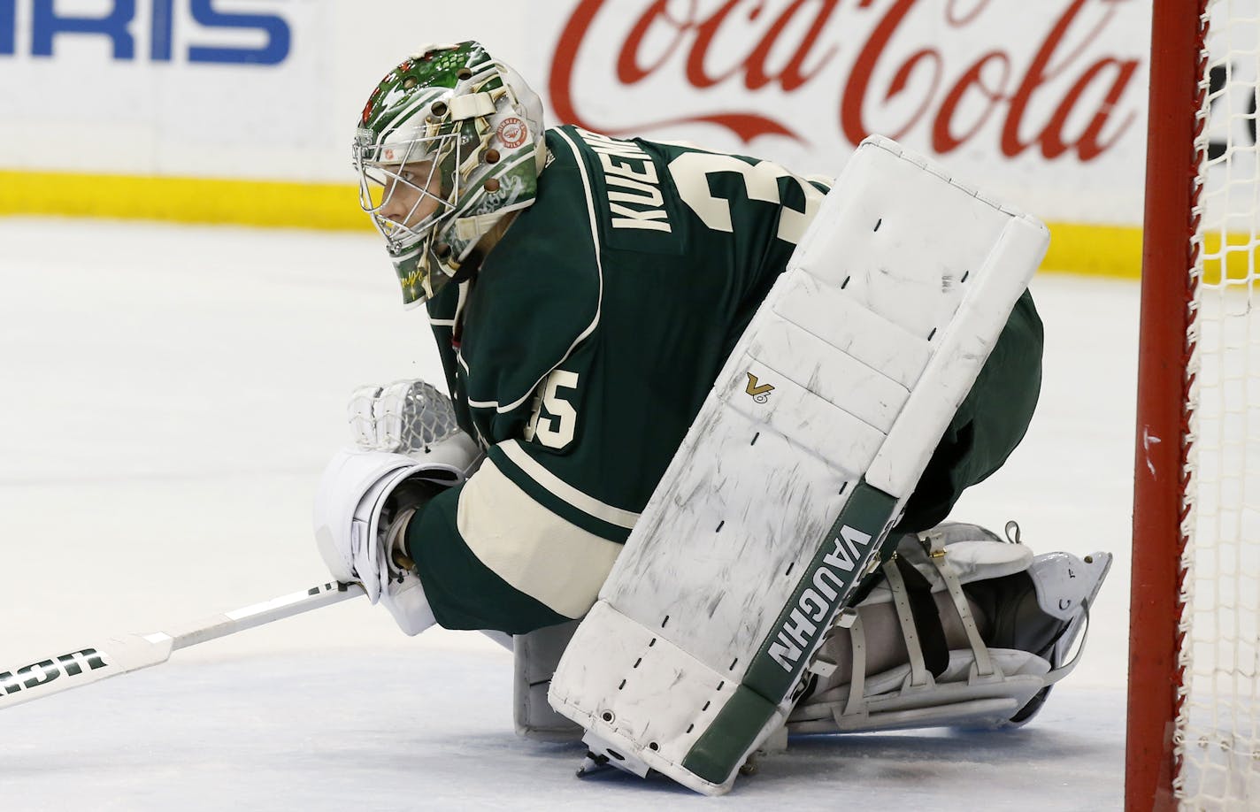 Minnesota Wild goalie Darcy Kuemper (35) stretches after replacing Devan Dubnyk during the second period of an NHL hockey game against the Colorado Avalanche in St. Paul, Minn., Saturday, Dec. 5, 2015. (AP Photo/Ann Heisenfelt)