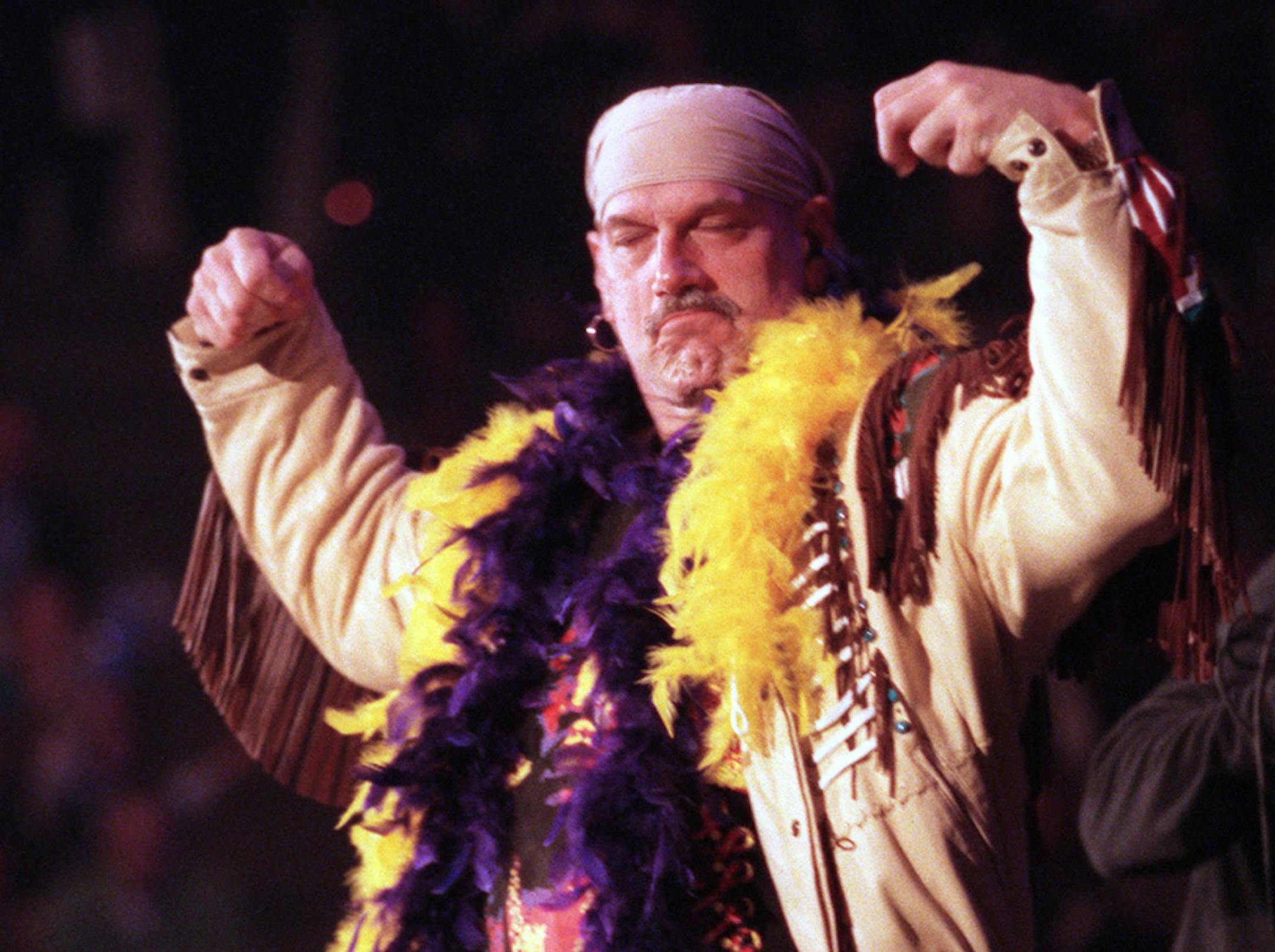 During The Peopleís Celebration on Jan. 16, 1999, Governor Jesse Ventura mounted the stage adorned in his buckskin jacket, lilac bandana, yellow and purple feather boas, and did some poses from his days as "Jesse The Body Ventura."