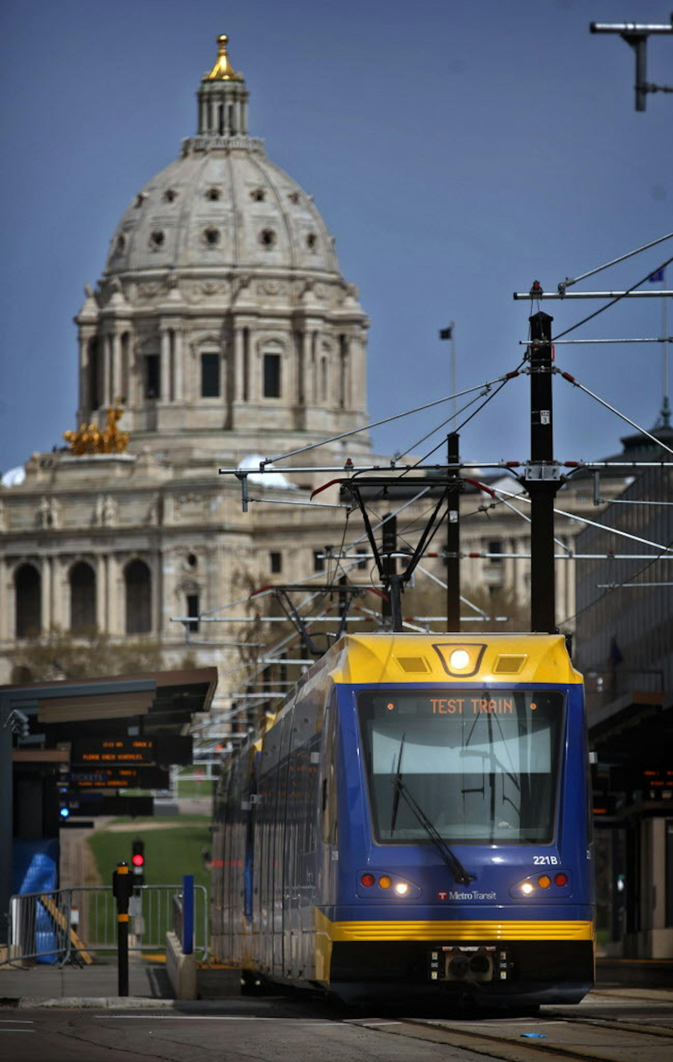 A train traveled west along University Avenue along the new Green Line. ] JIM GEHRZ &#x201a;&#xc4;&#xa2; jgehrz@startribune.com / Minneapolis, MN / May 13 , 2014 / 8:30 PM / BACKGROUND INFORMATION: The newly constructed Metro Transit Green Line is the largest public works project in state history. The line, which begins operation for the public on June 14, connects downtown St. Paul and downtown Minneapolis along an 8-mile light rail line. ORG XMIT: MIN1405141143099509 ORG XMIT: MIN1405301836199