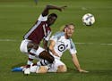Colorado Rapids forward Dominique Badji, left, and Minnesota United defender Brent Kallman went after the ball during the first half of an MLS soccer 