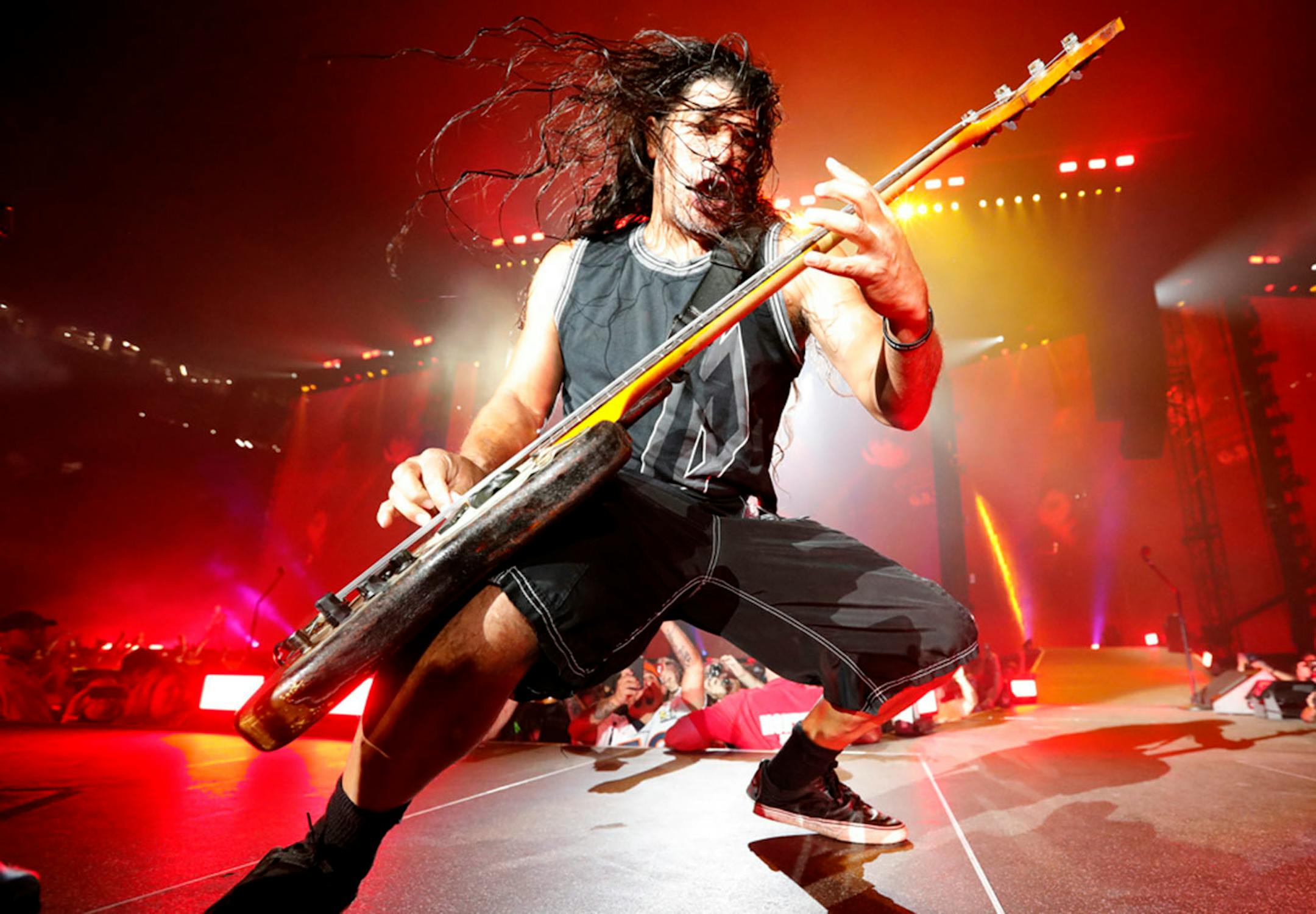 Metallica bass player Robert Trujillo let loose during a performance at US Bank Stadium.