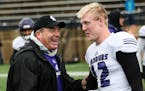 Winona State coach Tom Sawyer, pictured with Will Clausen, is retiring.