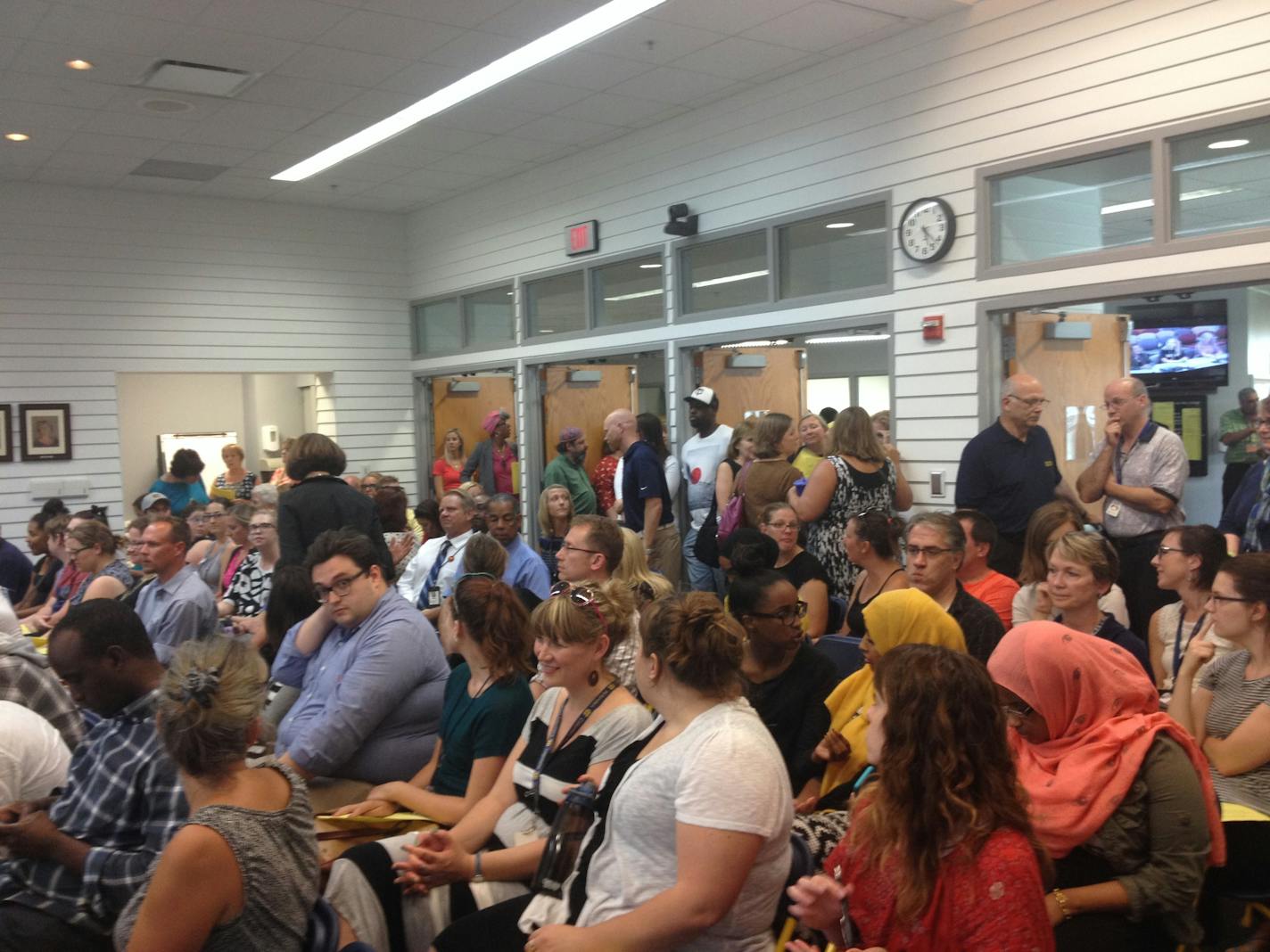 Photo by Beatrice Dupuy: The meeting room was packed as Tuesday night's Columbia Heights school board meeting got underway.