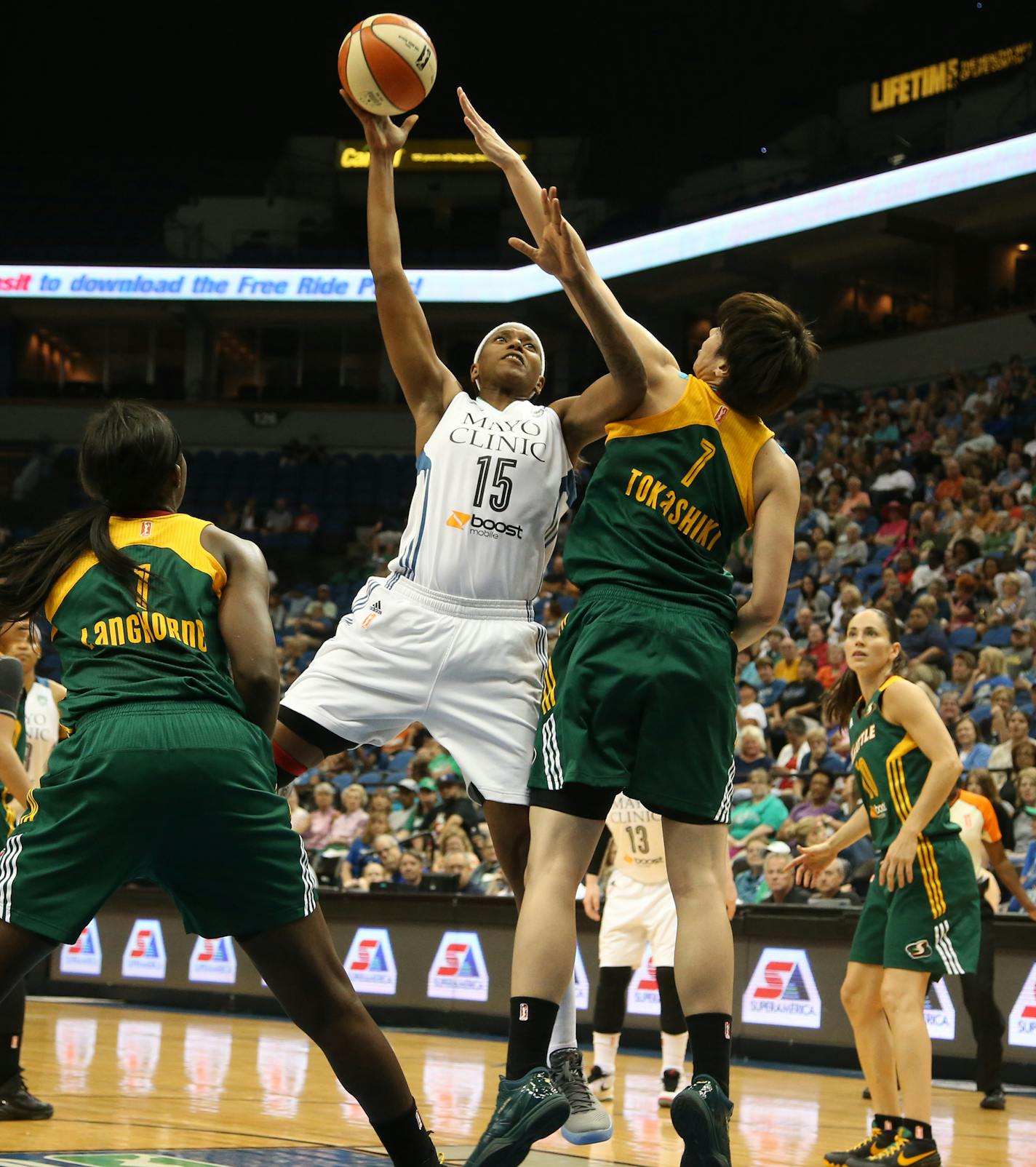 Lynx Asjha Jones went up for a mid range jumper against Seattle's Ramu Tokashiki during the first half. ] (KYNDELL HARKNESS/STAR TRIBUNE) kyndell.harkness@startribune.com Lynx vs Seattle at Target Center in Minneapolis, Min., Friday, July 3, 2015. Lynx won 82-57.