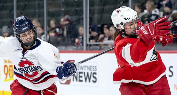 Anna Rausch, left, of Orono and Makayla Norsten of Willmar clashed for position in the first period Wednesday.