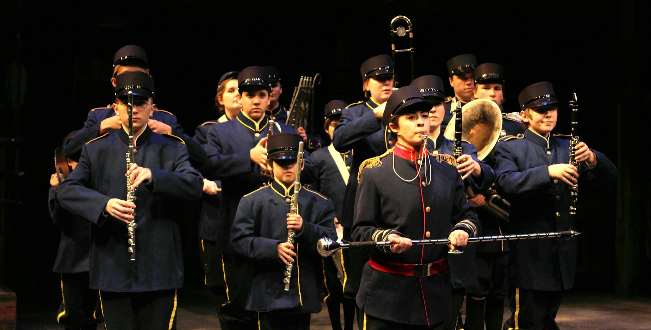 The boys band, led by drum major Andy (Christian Bardin), rehearse for the Loyalty Day Parade in the world premiere of THE WORKING BOYS BAND at History Theatre. Photo by Scott Pakudaitis, May 2014.