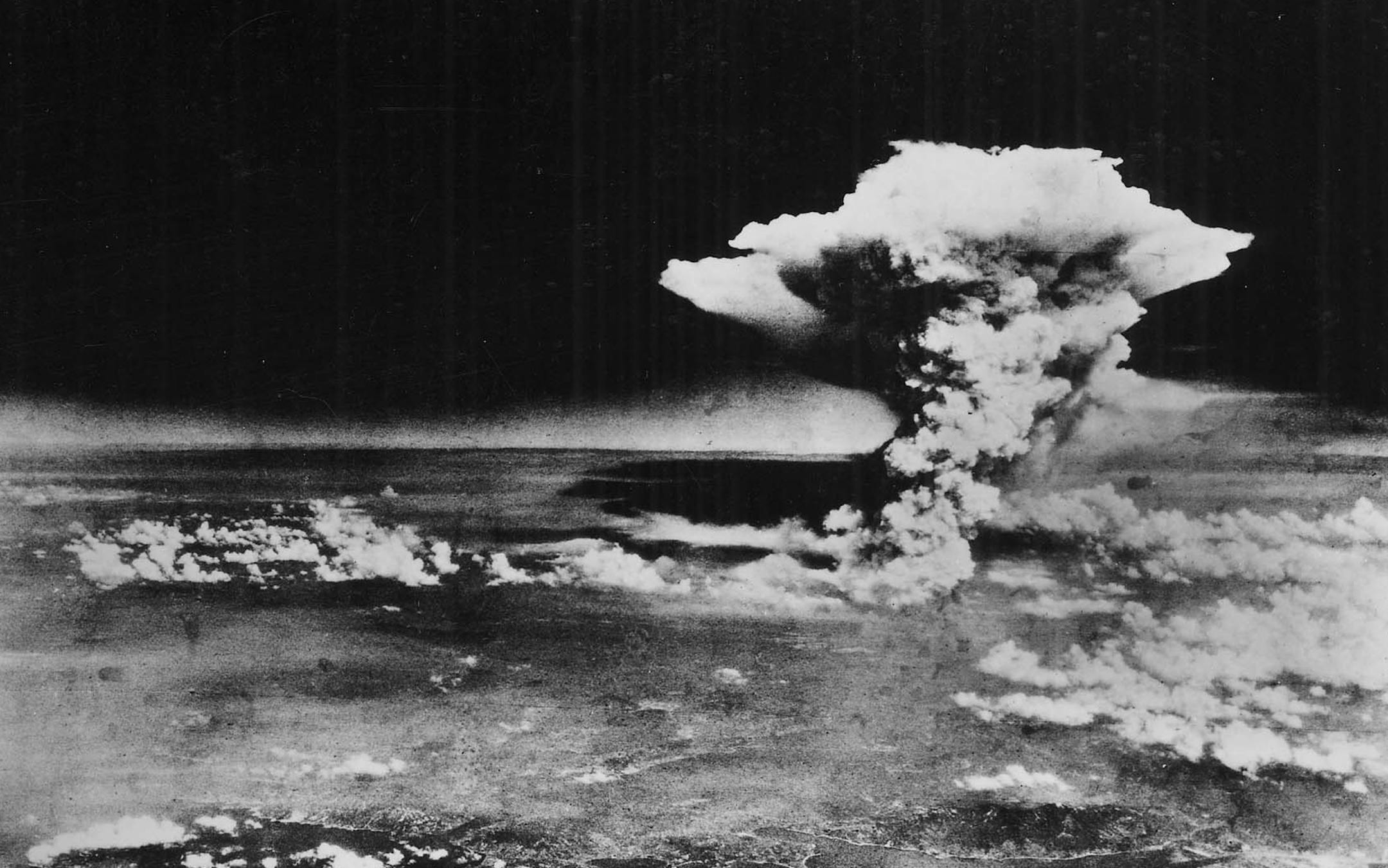FILE - The mushroom cloud rises from Hiroshima, Japan, on Aug. 6, 1945, after the first atomic bomb was dropped by a B-29 bomber, as seen in this photo provided by the U.S. Army. President Obama will become the first sitting American president to visit Hiroshima making a heavily symbolic stop on May, 27, 2016, at the site where the United States first used an atomic bomb at the end of World War II. (U.S. Army via The New York Times) -- EDITORIAL USE ONLY -- ORG XMIT: MIN2016051313573854