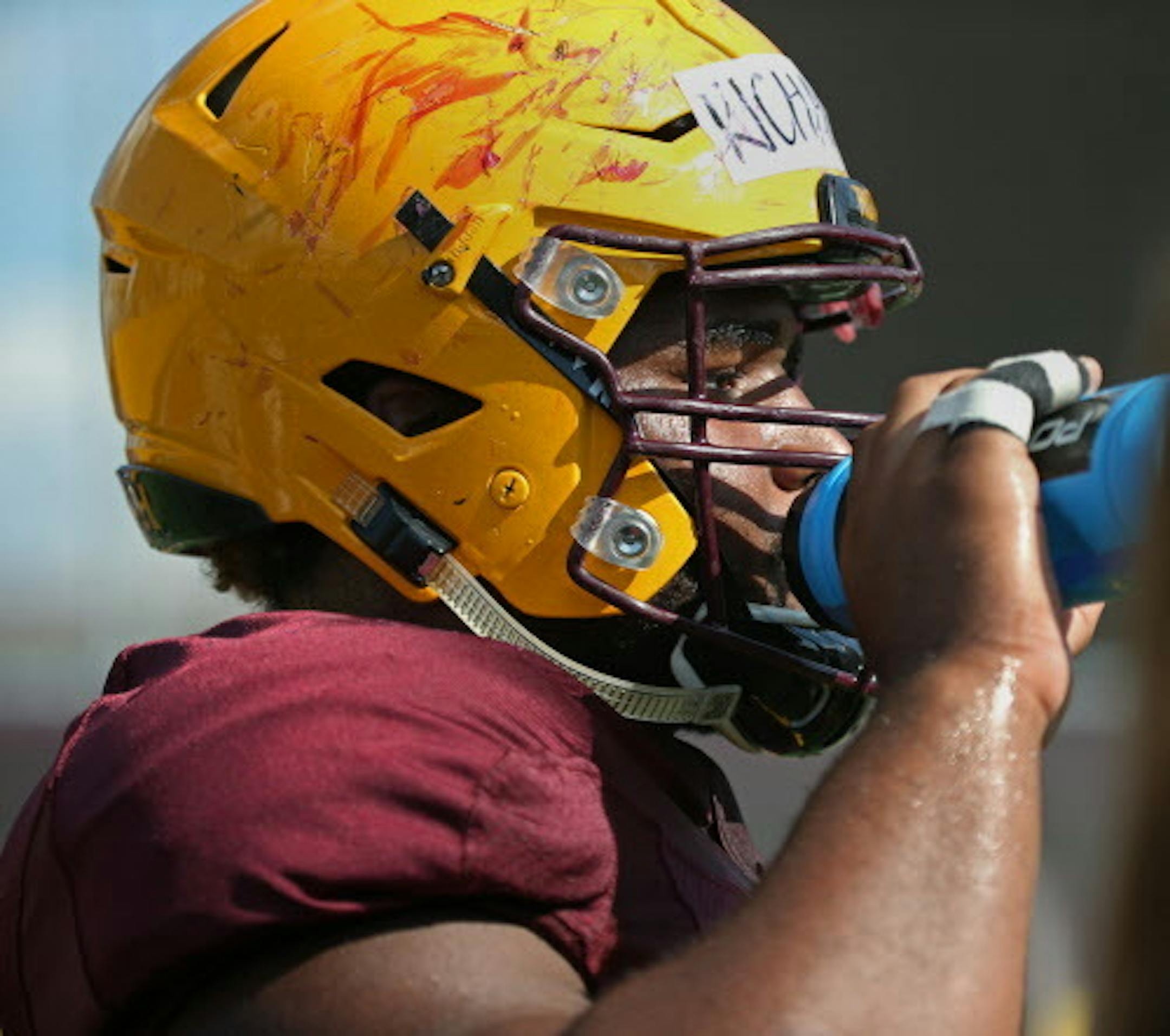 Defensive lineman Steven Richardson took an opportunity to grab a drink between drills. ]  Shari L. Gross ' sgross@startribune.com     University of Minnesota Gophers football practice shot Friday, August 11, 2017.