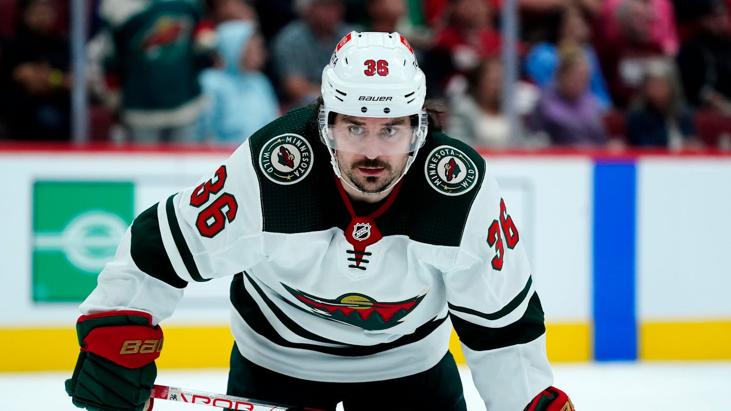 Minnesota Wild right wing Mats Zuccarello waits for a face off against the Arizona Coyotes during the second period of an NHL hockey game Wednesday, Nov. 10, 2021, in Glendale, Ariz. (AP Photo/Ross D. Franklin)