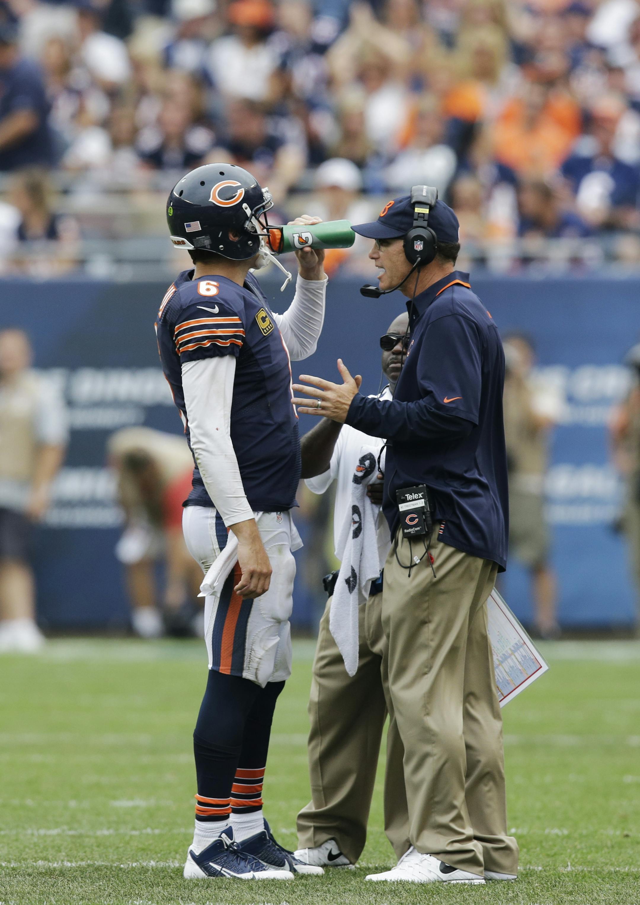 Chicago Bears head coach Marc Trestman, right, talks to quarterback Jay Cutler (6) during the second half of an NFL football game, Sunday, Sept. 8, 2013, in Chicago. Bears won 24-21. (AP Photo/Nam Y. Huh) ORG XMIT: CXB1 ORG XMIT: MIN1309082319160480