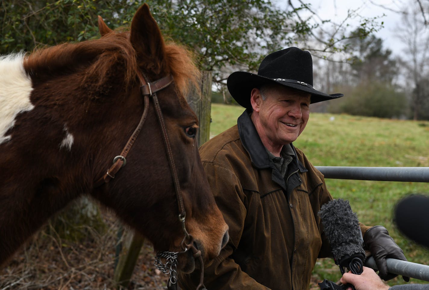 GOP candidate ROY MOORE, arrives riding his horse Sassy to the Fire Station in Gallant to cast his vote for Senate Special Election, December 12, 2017, in Gallant, Alabama, United States (Miguel Juarez Lugo/Zuma Press/TNS) ORG XMIT: 1218335