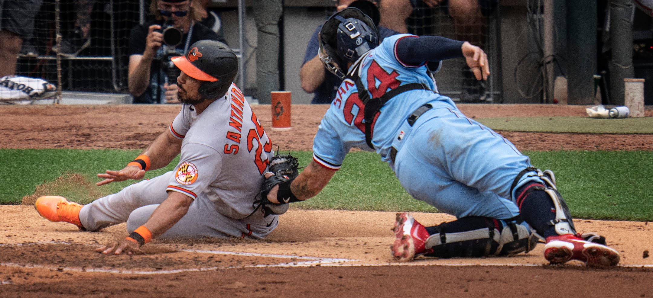 Baltimore Orioles right fielder Anthony Santander was tagged out by Minnesota Twins catcher Gary Sanchez (24) in the fourth inning.