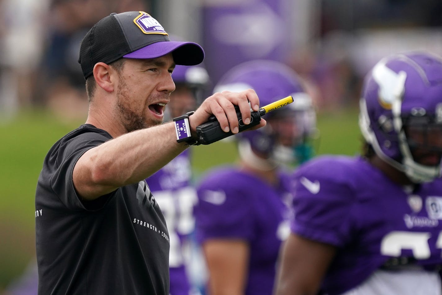 Vikings offensive coordinator Klint Kubiak called plays during training camp in August.