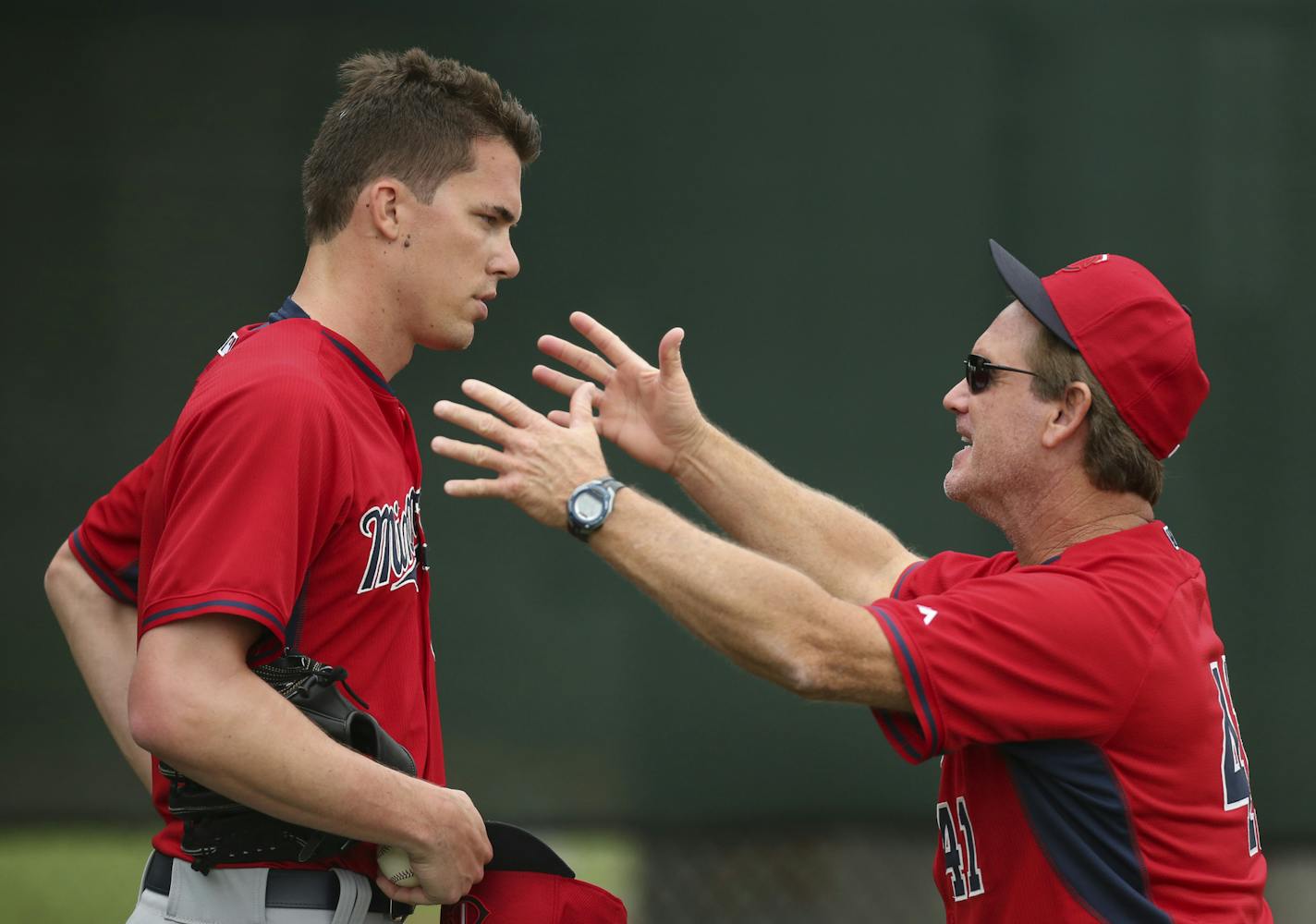 Twins pitching coach Neil Allen talked with Twins pitcher Alex Meyer in the bullpen during spring training.