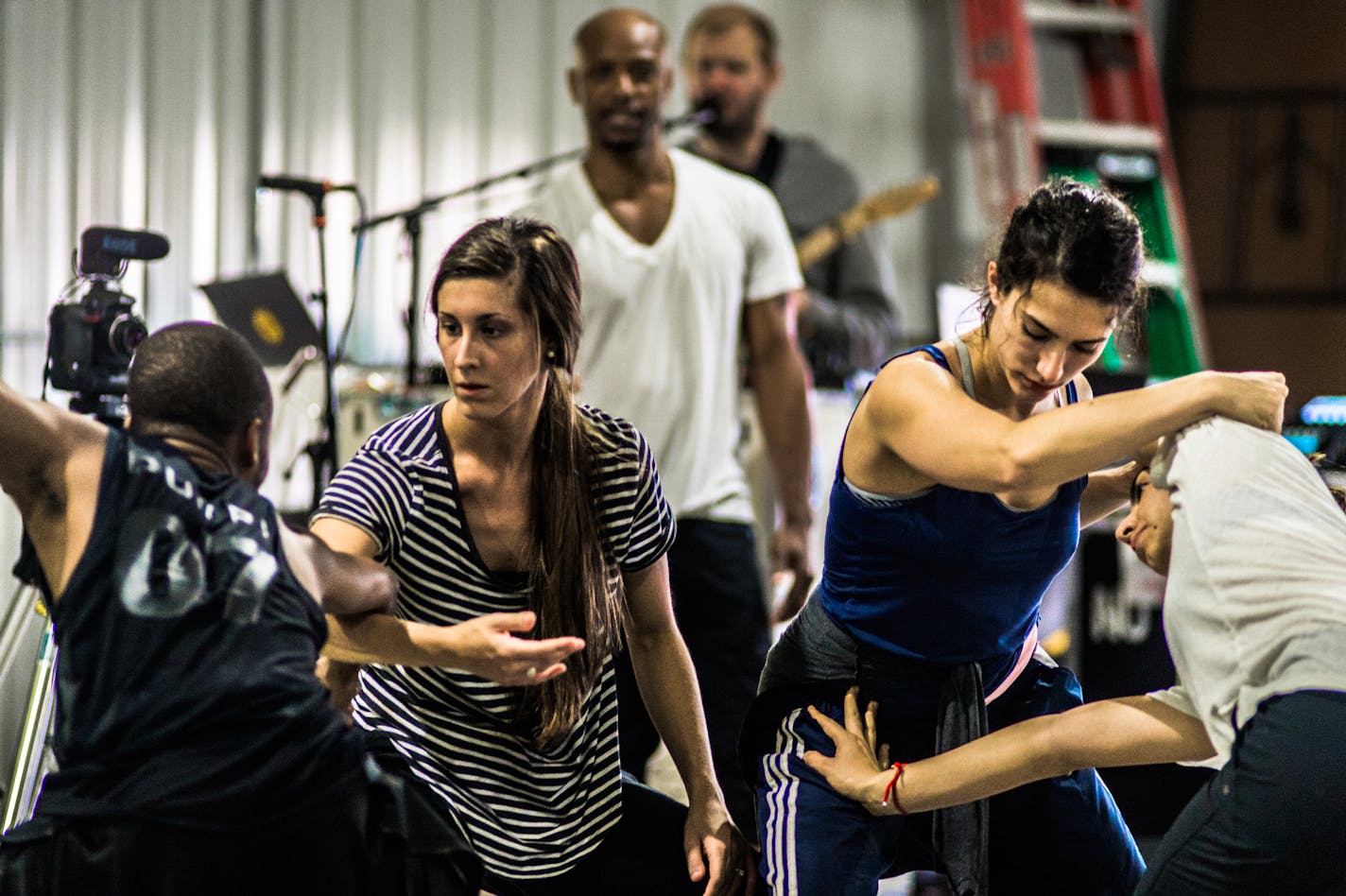 Choreographer Uri Sands and Grammy-winning musician Justin Vernon, center, watched dancers rehearse their collaborative show.