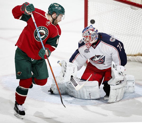 With Jason Zucker (16) in front of the net Columbus goalie Sergei Bobrovsky (72) made a save in the second period.