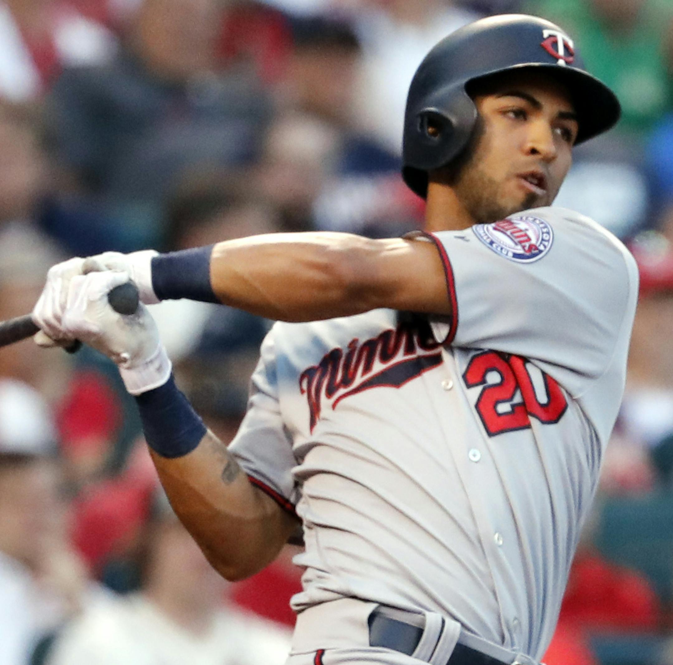 Minnesota Twins' Eddie Rosario follows through on an RBI double during the first inning of a baseball game against the St. Louis Cardinals Monday, May 7, 2018, in St. Louis. (AP Photo/Jeff Roberson)