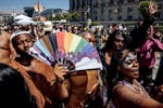 Revelers dance to the music at the hip-hop stage during pride celebrations at Civic Center in San Francisco, Saturday, June 29, 2024.