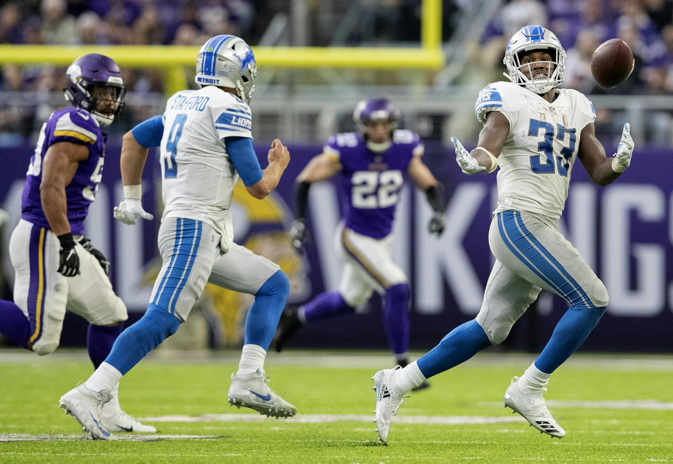Kerryon Johnson (33) could not handle a pitch by Matthew Stafford in the fourth quarter. Danielle Hunter recovered a fumble and returned it 32-yards for a touchdown.