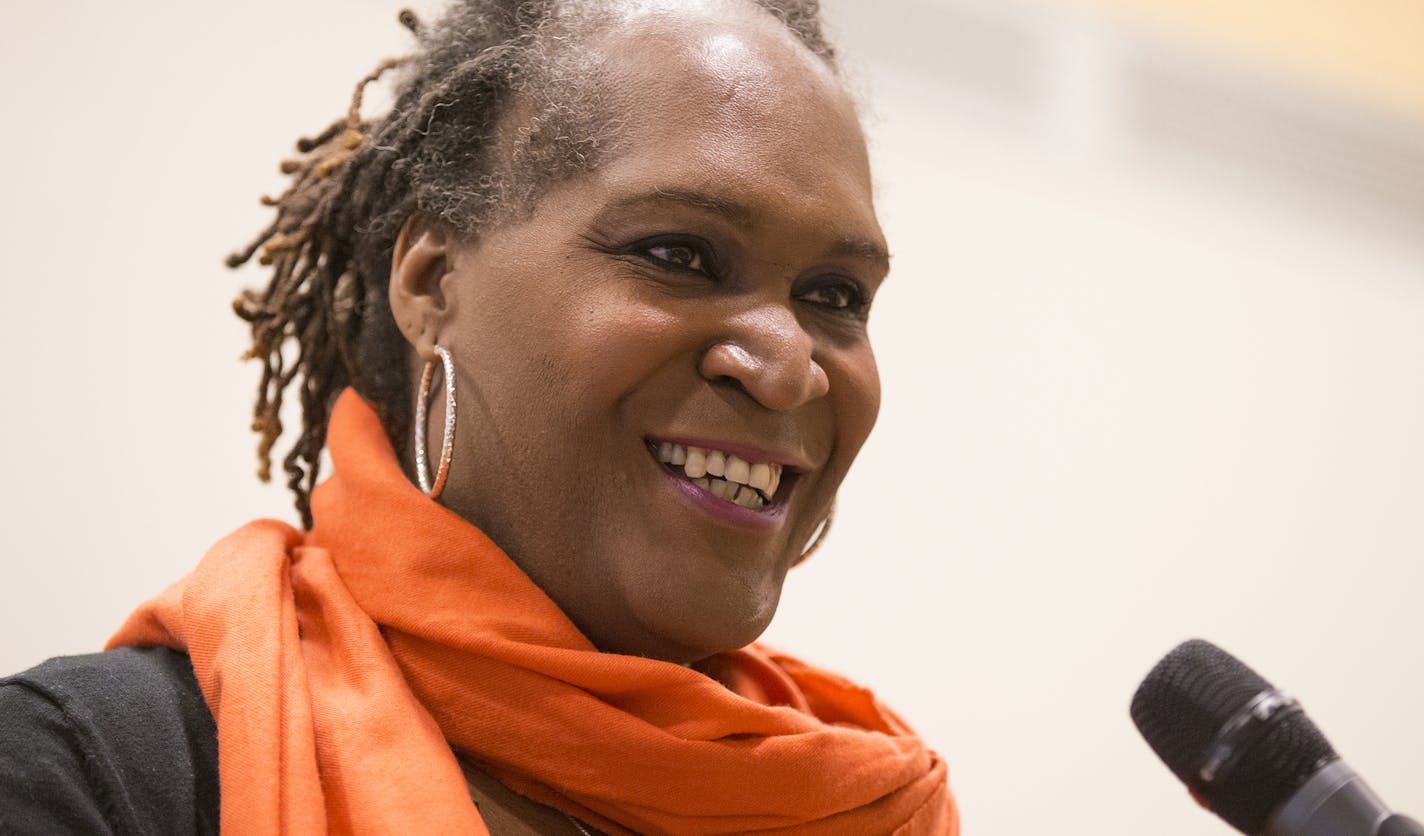 Local writer Andrea Jenkins does a reading of her work at Queer Voices, an event she co-curated to bring together LGBT poets and writers as part of the Association of Writers & Writing Conference, at the Minneapolis Central Library in downtown Minneapolis on Thursday, April 9, 2015. ] LEILA NAVIDI leila.navidi@startribune.com /