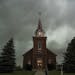 Dark storm clouds and wind came through Vasa, Minn., at Vasa Lutheran Church on Sunday, June 11, 2017.