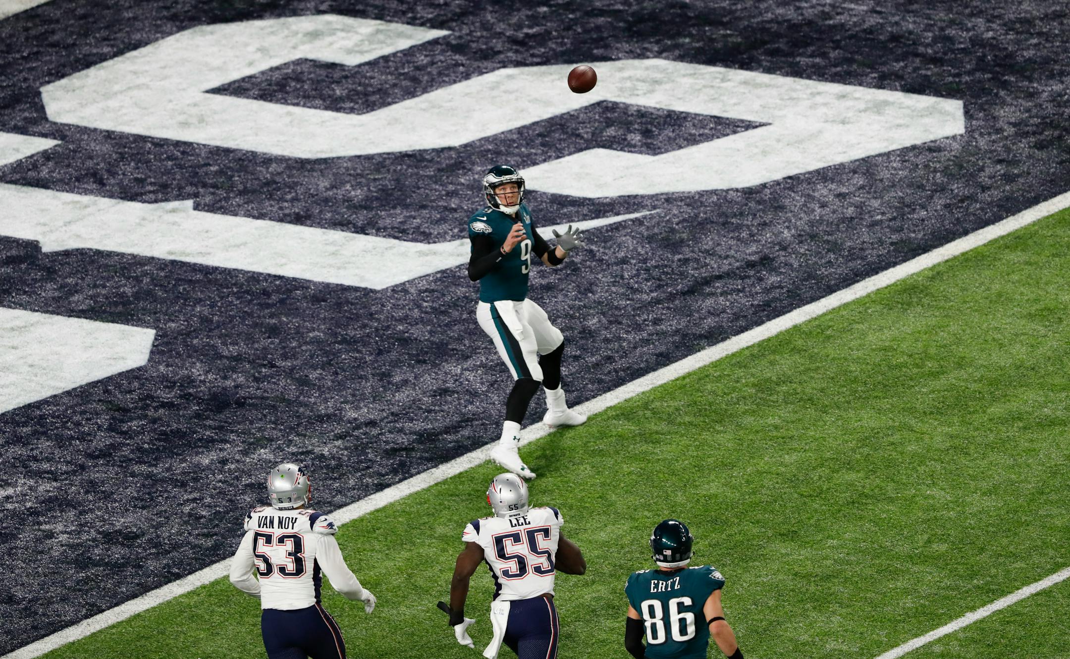 Eagles QB Nick Foles caught a trick-play touchdown pass from tight end Trey Burton on fourth down during Super Bowl LII against the Patriots. More coaches are now willing to take fourth-down risks.