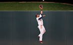 Minnesota Twins centerfielder Aaron Hicks (32) made a leaping catch to rob Gregory Polanco earlier this season.