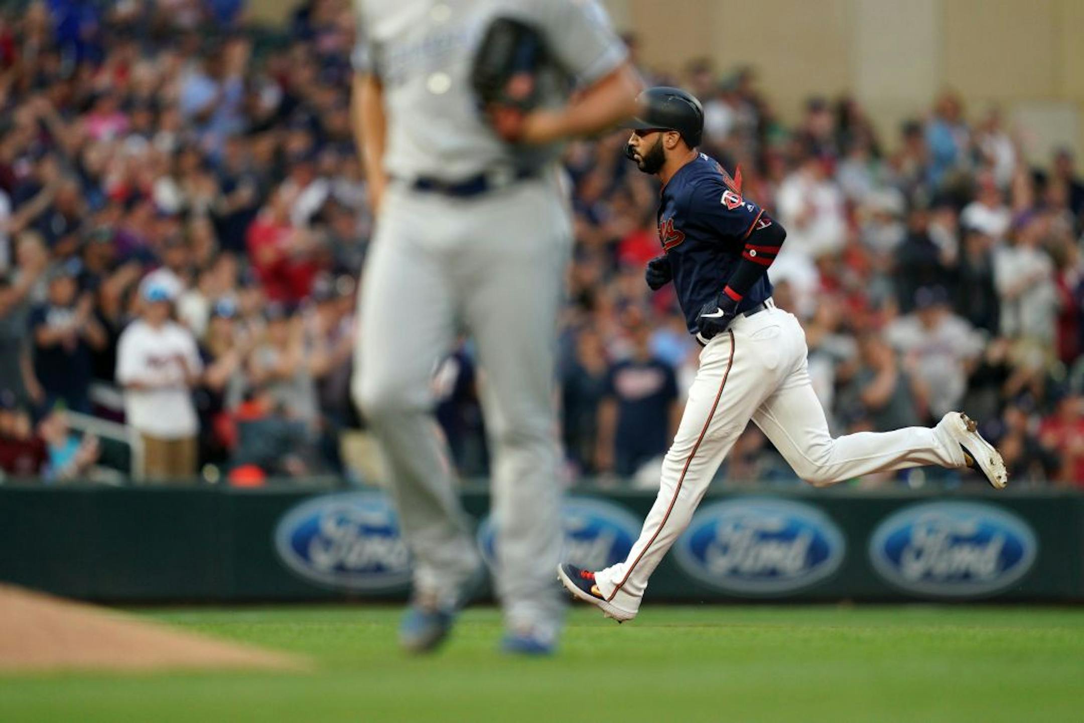 Minnesota Twins third baseman Marwin Gonzalez (9) rounded the bases after hitting a two-run home run in the fifth inning.