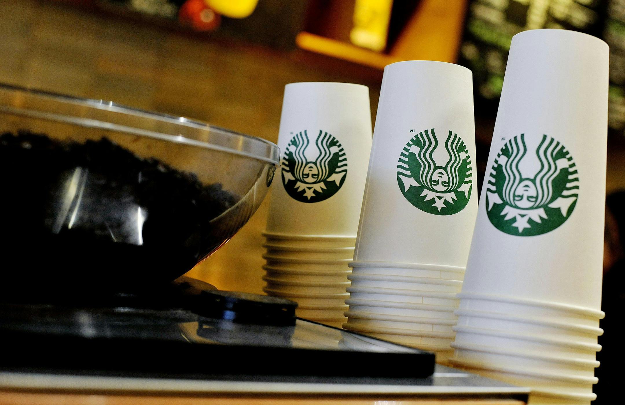 While Starbucks isn't disclosing the expected cost of the new backup care benefit, available effective Tuesday, it is part of a package of pay raises and new perks that the company said in January would have an estimated first-year cost of $250 million. (Nick Ansell/PA Wire/Zuma Press/TNS)