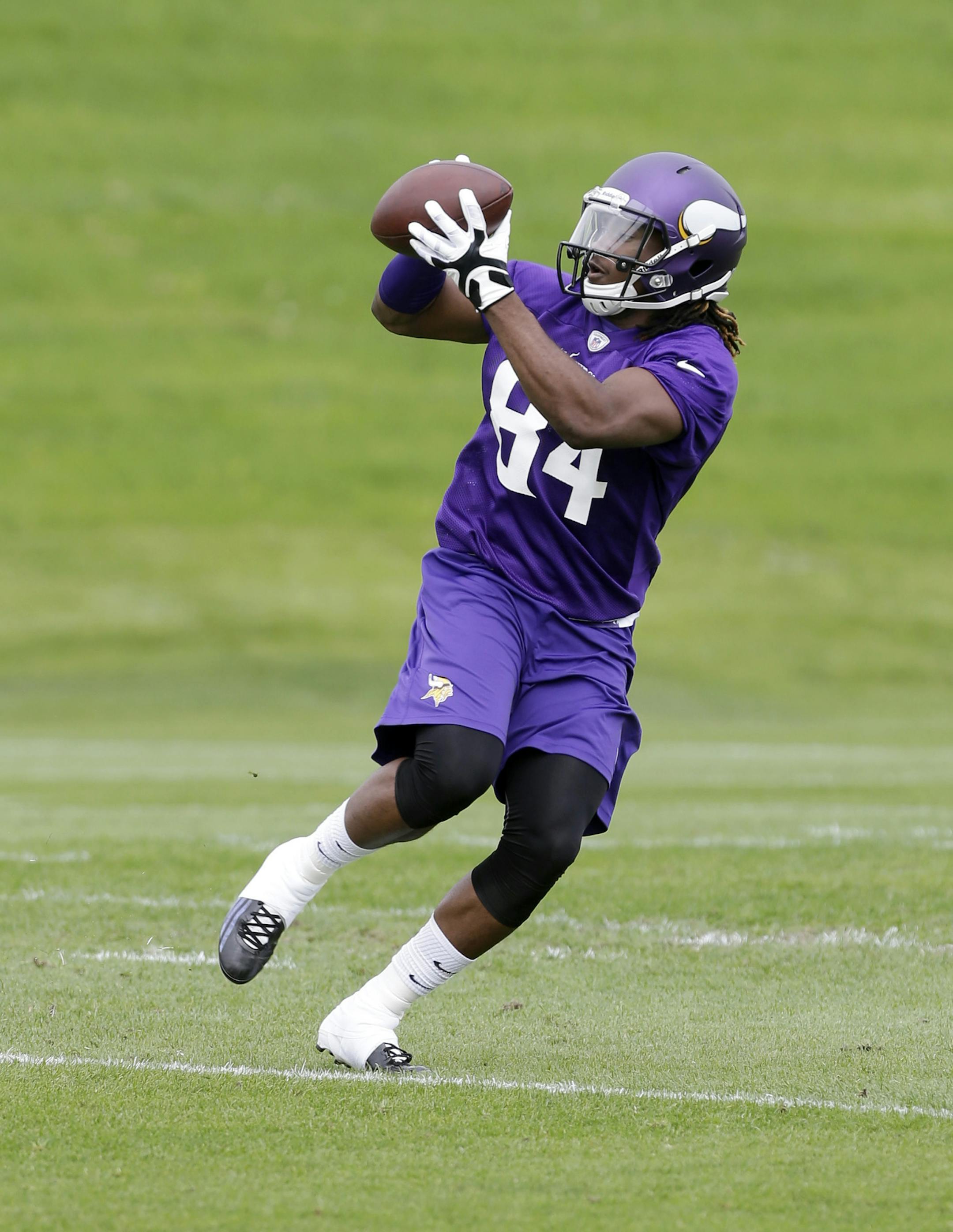 Minnesota Vikings wide receiver Cordarrelle Patterson (84) goes through drills during Organized Team Activities (OTA) Wednesday, May 29, 2013 in Eden Prairie, Minn. (AP Photo/Jim Mone)