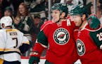 Wild forwards Zach Parise (11) and Jason Pominville (29) will miss Monday's game against the Los Angeles Kings after being diagnosed with the mumps. W