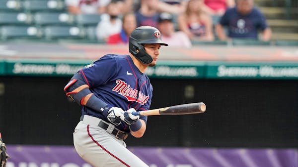 Minnesota Twins' Trevor Larnach bats against the Cleveland Indians in a baseball game, Friday, May 21, 2021, in Cleveland. (AP Photo/Tony Dejak)