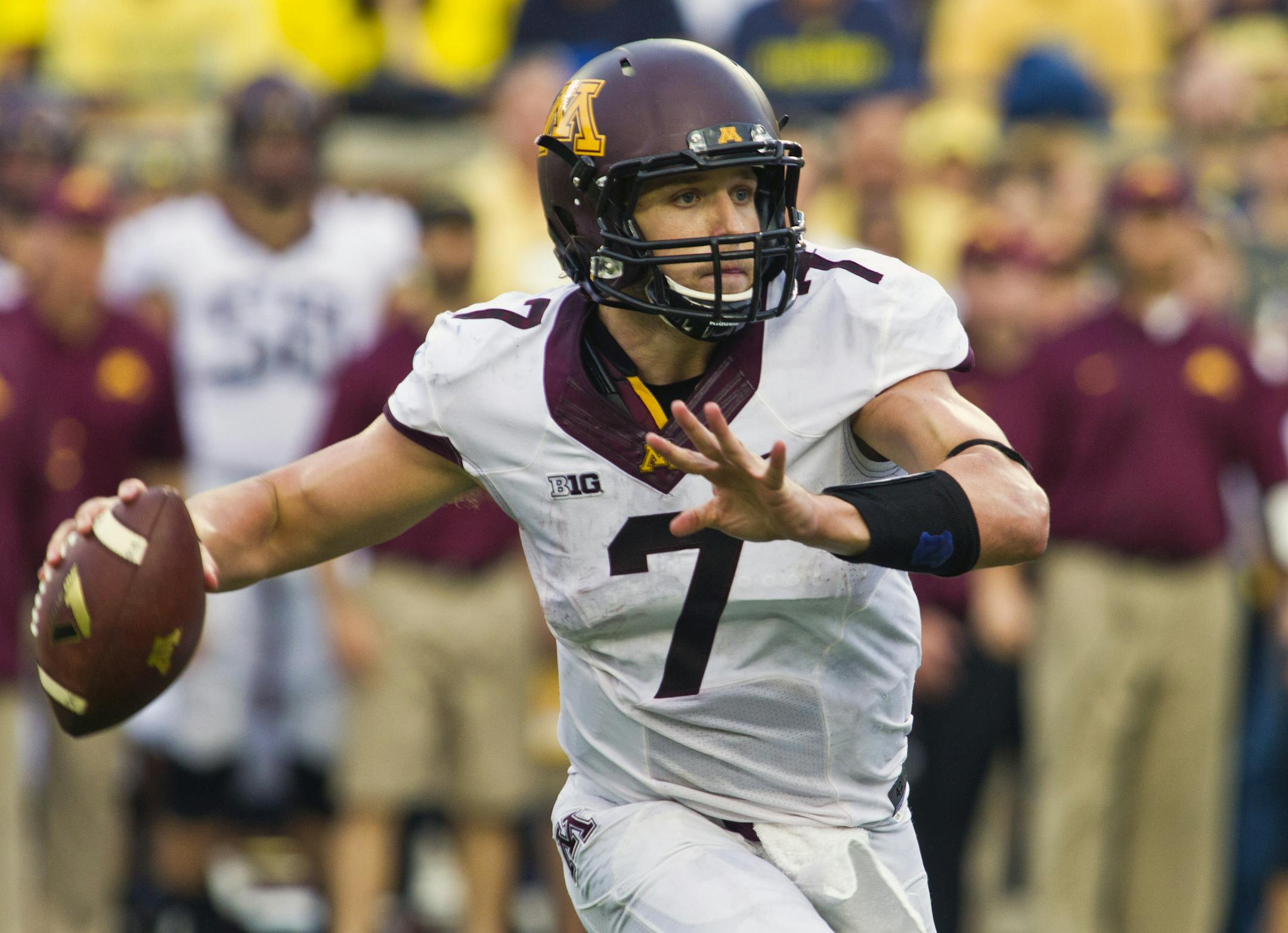 Minnesota quarterback Mitch Leidner (7) throws a pass in the fourth quarter of an NCAA college football game with Michigan, Saturday, Oct. 5, 2013, in Ann Arbor, Mich. (AP Photo/Tony Ding) ORG XMIT: MIN2013101815000947 ORG XMIT: MIN1310181511108028