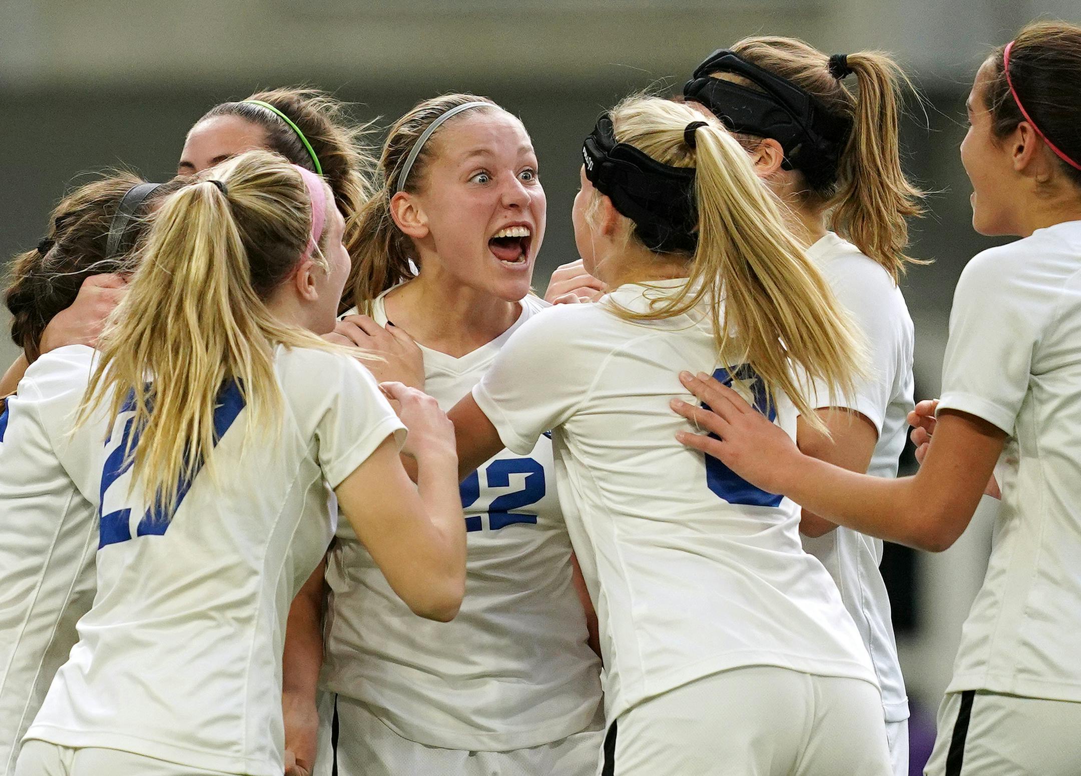 Minnetonka Riley Brackin (22) shouted as she was mobbed by her teammates after scoring a goal in the first half. ] ANTHONY SOUFFLE ï anthony.souffle@startribune.com Minnetonka High School played Wayzata High School in a Class 2A girls' soccer championship match Friday, Nov. 2, 2018 at U.S. Bank Stadium in Minneapolis.